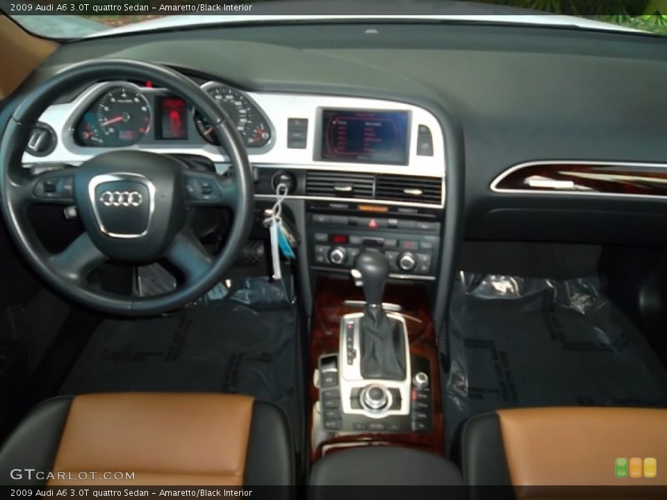 Amaretto/Black Interior Dashboard for the 2009 Audi A6 3.0T quattro Sedan #57514654