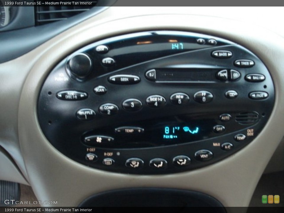 Medium Prairie Tan Interior Controls for the 1999 Ford Taurus SE #57529738