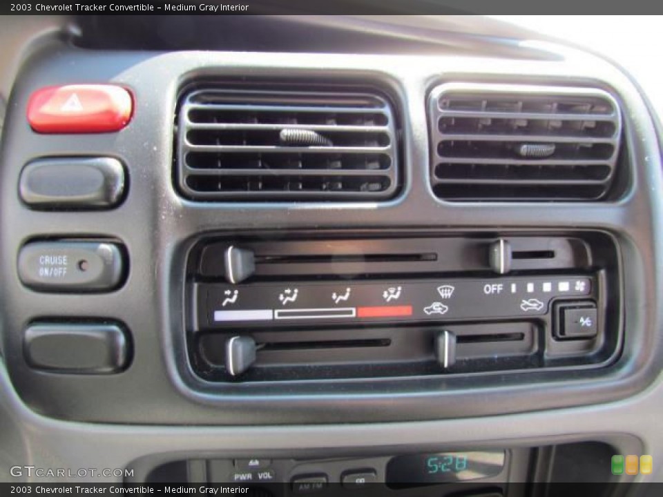 Medium Gray Interior Controls for the 2003 Chevrolet Tracker Convertible #57630229