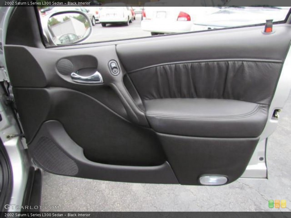 Black Interior Door Panel for the 2002 Saturn L Series L300 Sedan #57630535