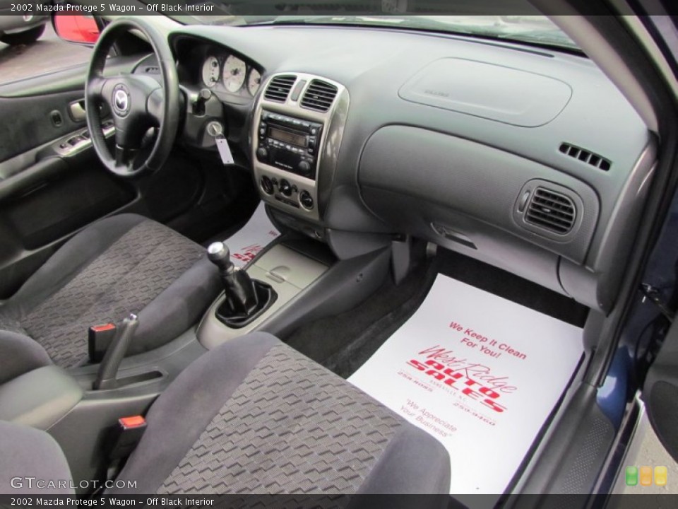 Off Black Interior Dashboard for the 2002 Mazda Protege 5 Wagon #57631819