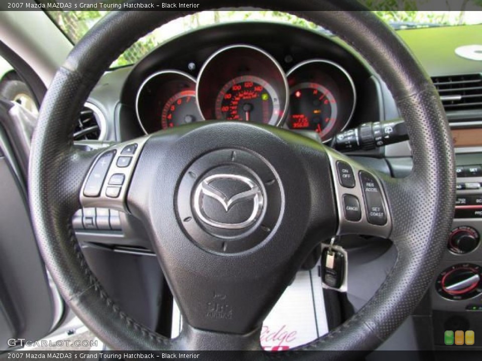 Black Interior Steering Wheel for the 2007 Mazda MAZDA3 s Grand Touring Hatchback #57637399