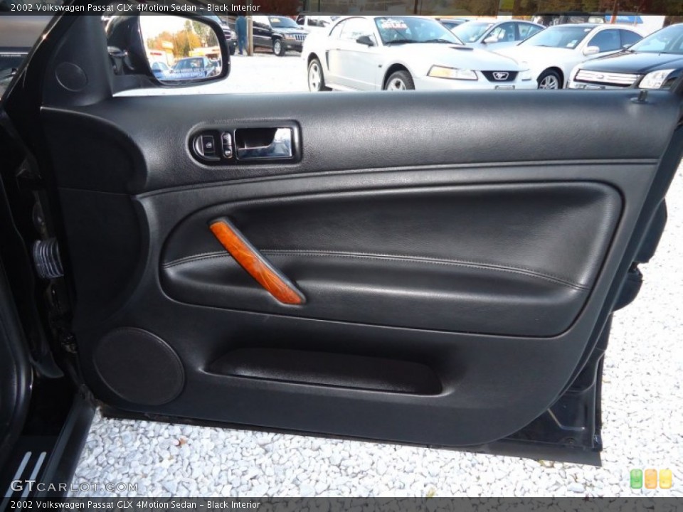Black Interior Door Panel for the 2002 Volkswagen Passat GLX 4Motion Sedan #57645880