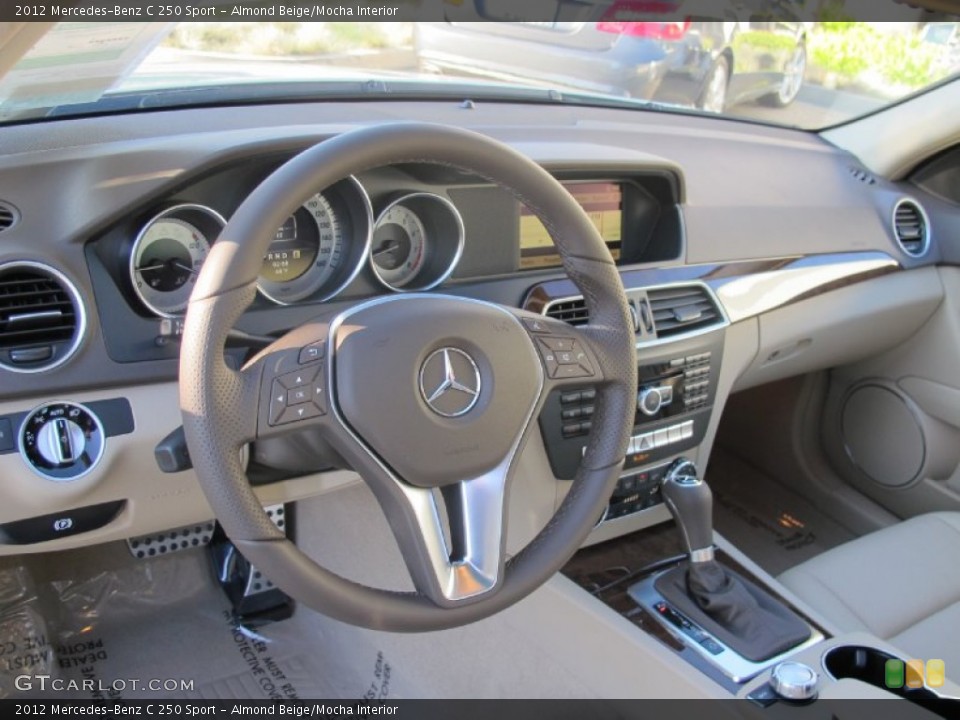 Almond Beige/Mocha Interior Dashboard for the 2012 Mercedes-Benz C 250 Sport #57646558
