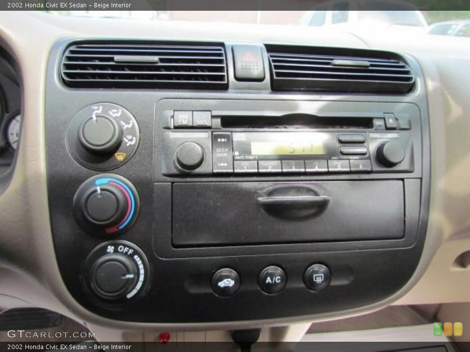 Beige Interior Controls for the 2002 Honda Civic EX Sedan #57647158