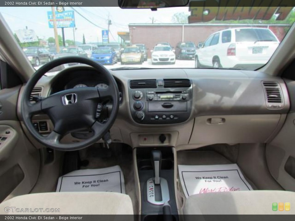 Beige Interior Dashboard for the 2002 Honda Civic EX Sedan #57647218