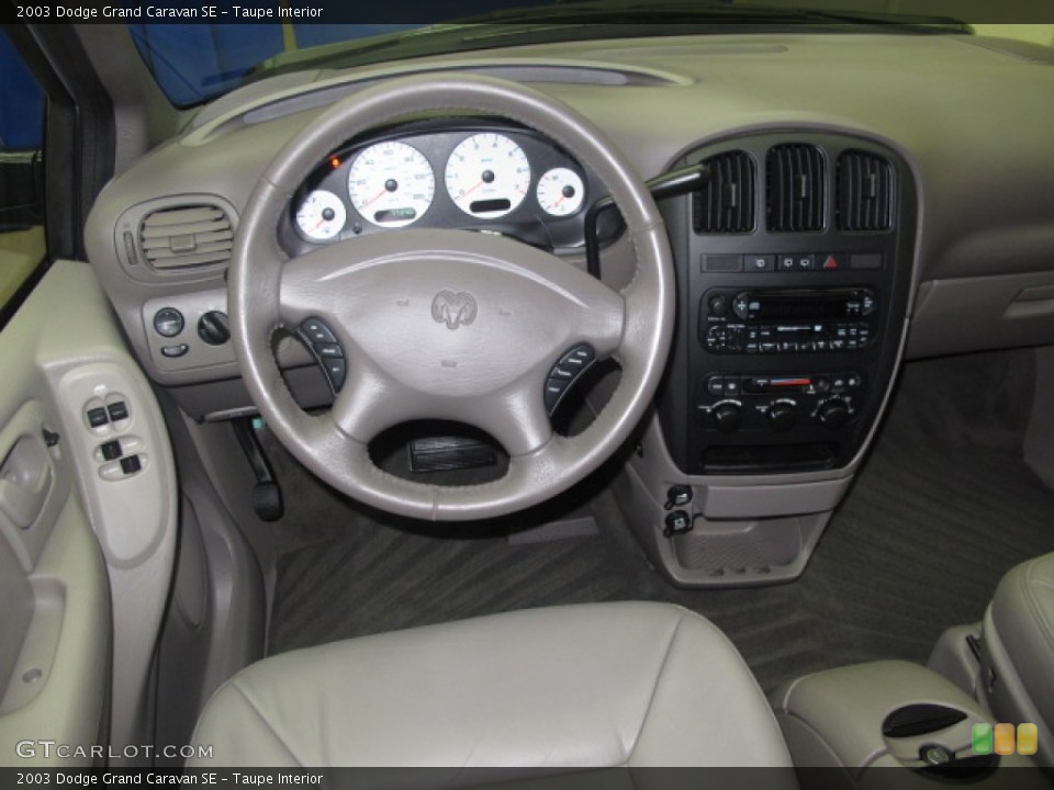 Taupe Interior Dashboard for the 2003 Dodge Grand Caravan SE #57655564