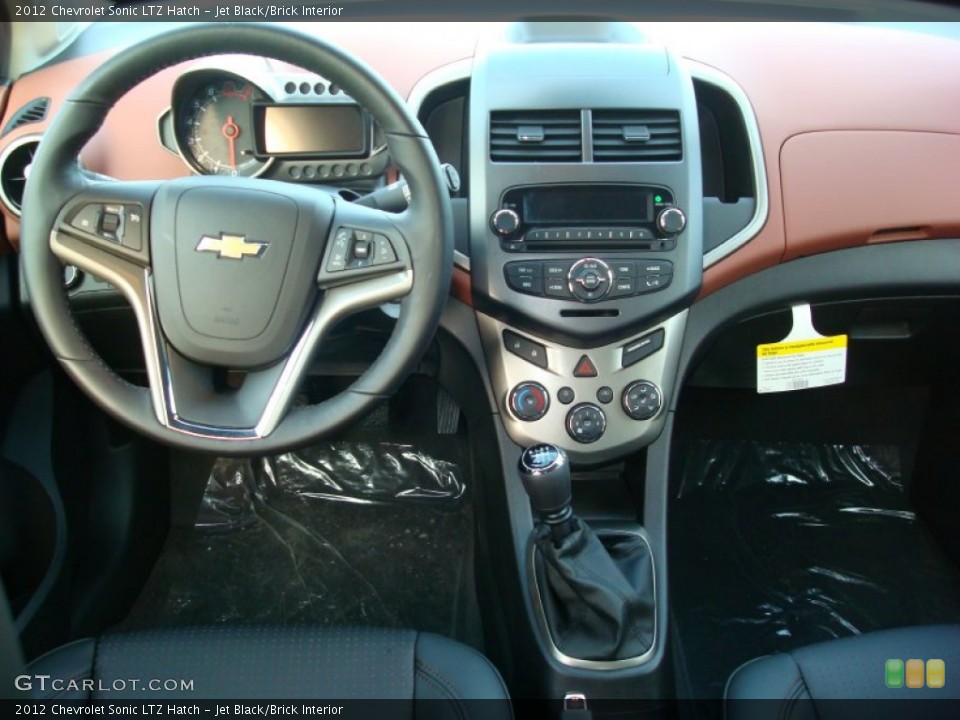 Jet Black/Brick Interior Dashboard for the 2012 Chevrolet Sonic LTZ Hatch #57697676