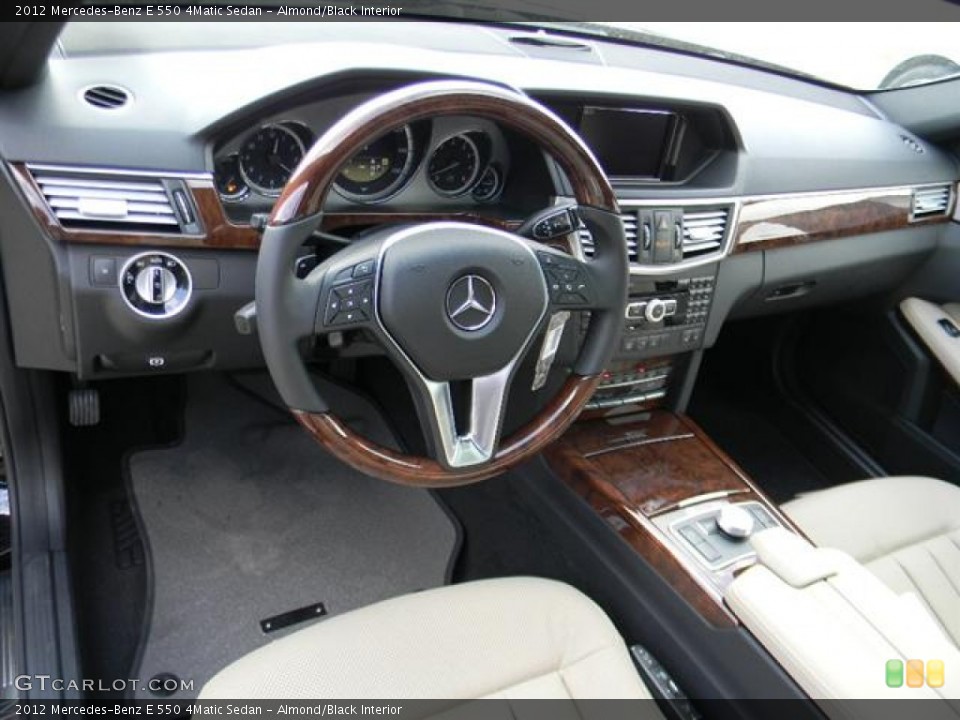 Almond/Black Interior Dashboard for the 2012 Mercedes-Benz E 550 4Matic Sedan #57739653