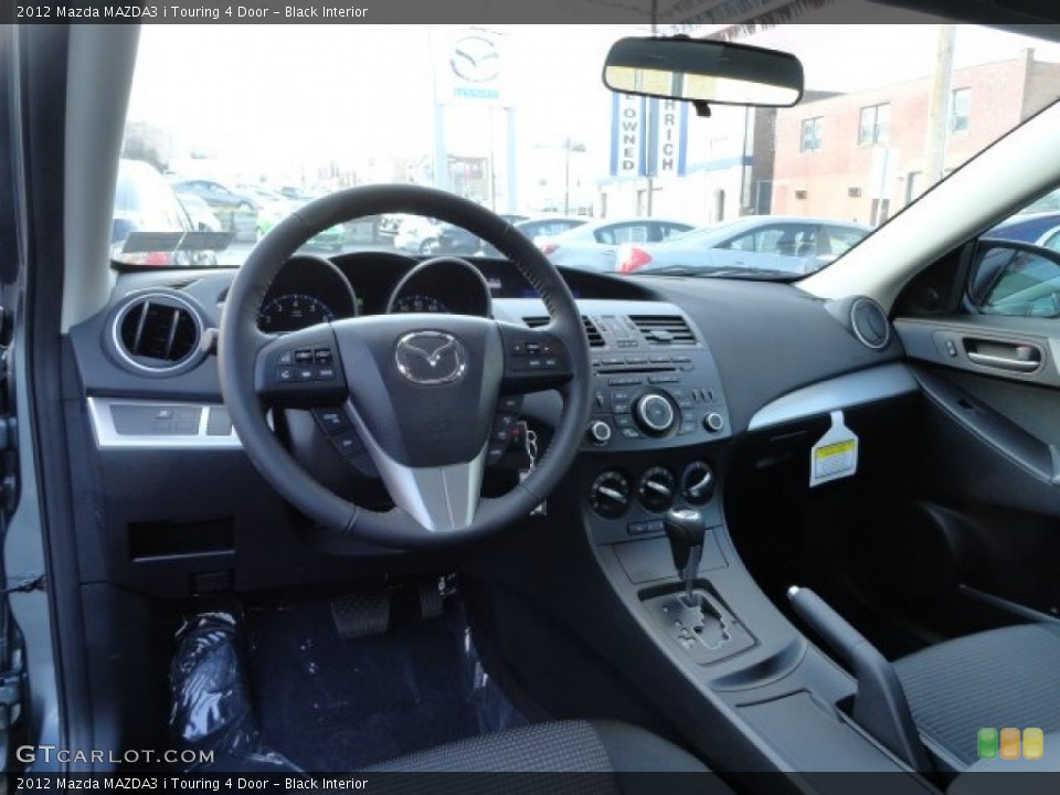 Black Interior Dashboard for the 2012 Mazda MAZDA3 i Touring 4 Door #57757316