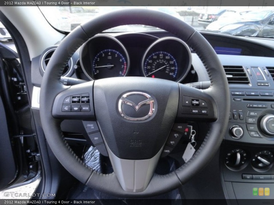 Black Interior Steering Wheel for the 2012 Mazda MAZDA3 i Touring 4 Door #57757547