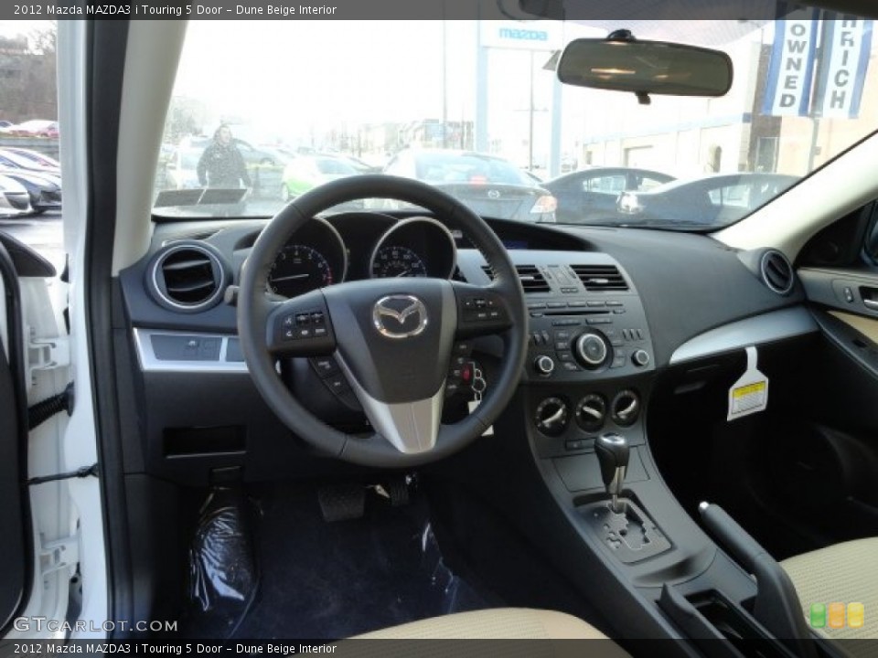Dune Beige Interior Dashboard for the 2012 Mazda MAZDA3 i Touring 5 Door #57758237