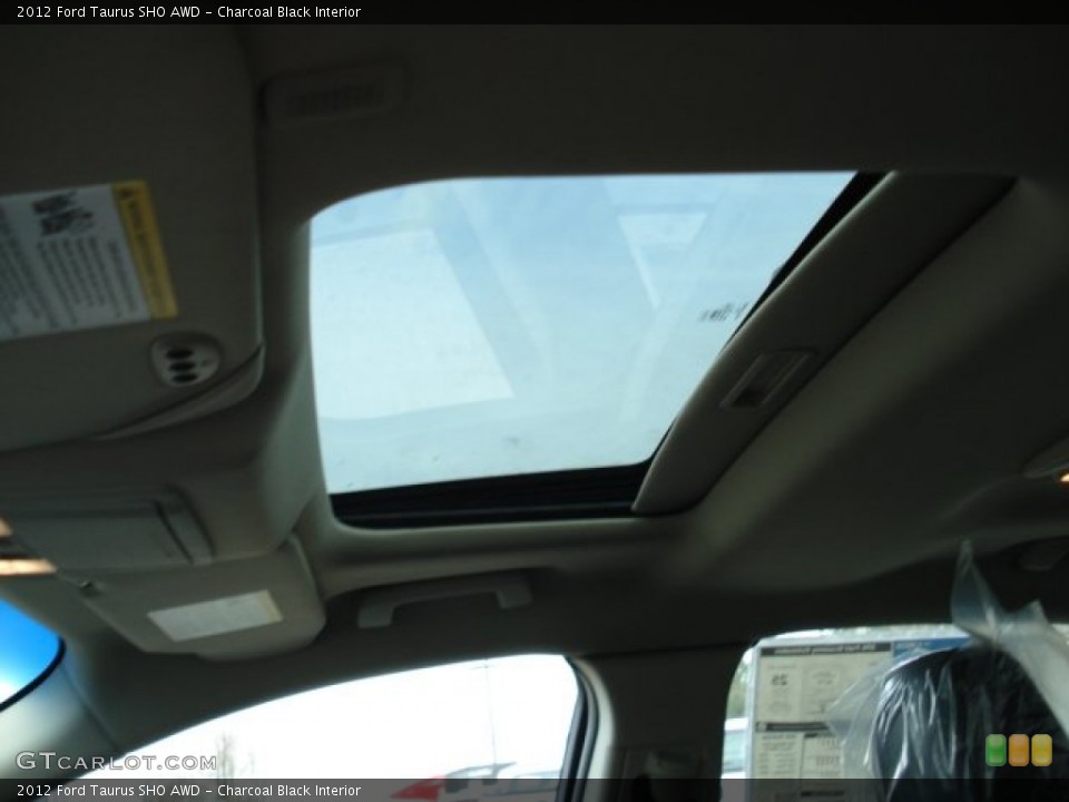 Charcoal Black Interior Sunroof for the 2012 Ford Taurus SHO AWD #57773817