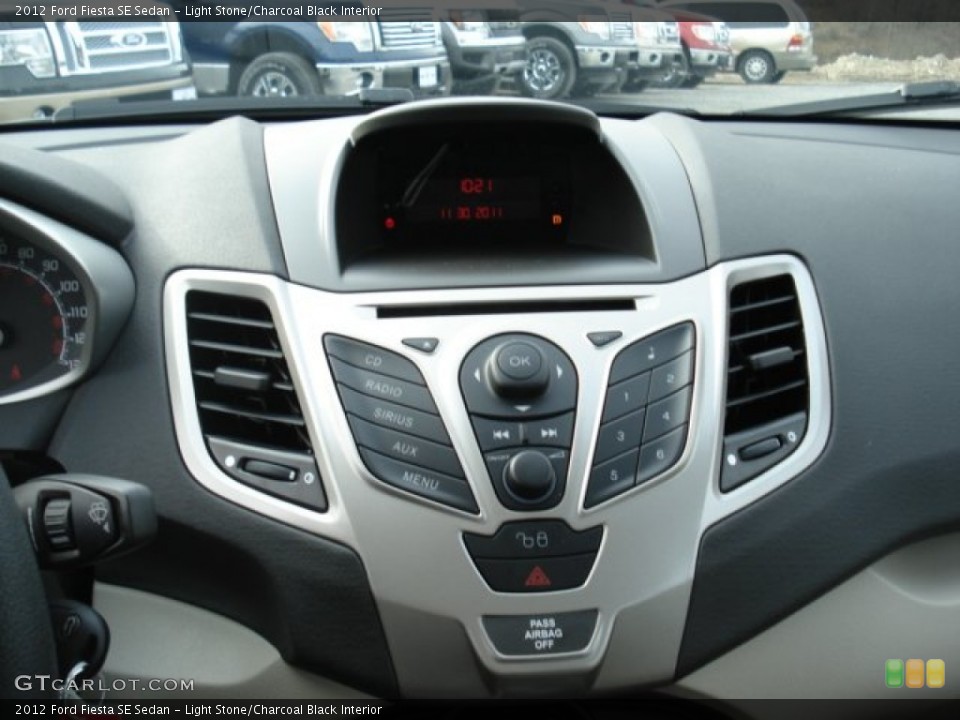 Light Stone/Charcoal Black Interior Controls for the 2012 Ford Fiesta SE Sedan #57774816