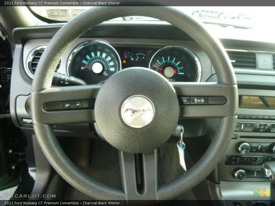 Charcoal Black Interior Steering Wheel for the 2011 Ford Mustang GT Premium Convertible #57806708