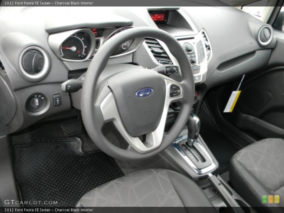 Charcoal Black Interior Dashboard for the 2012 Ford Fiesta SE Sedan #57883147