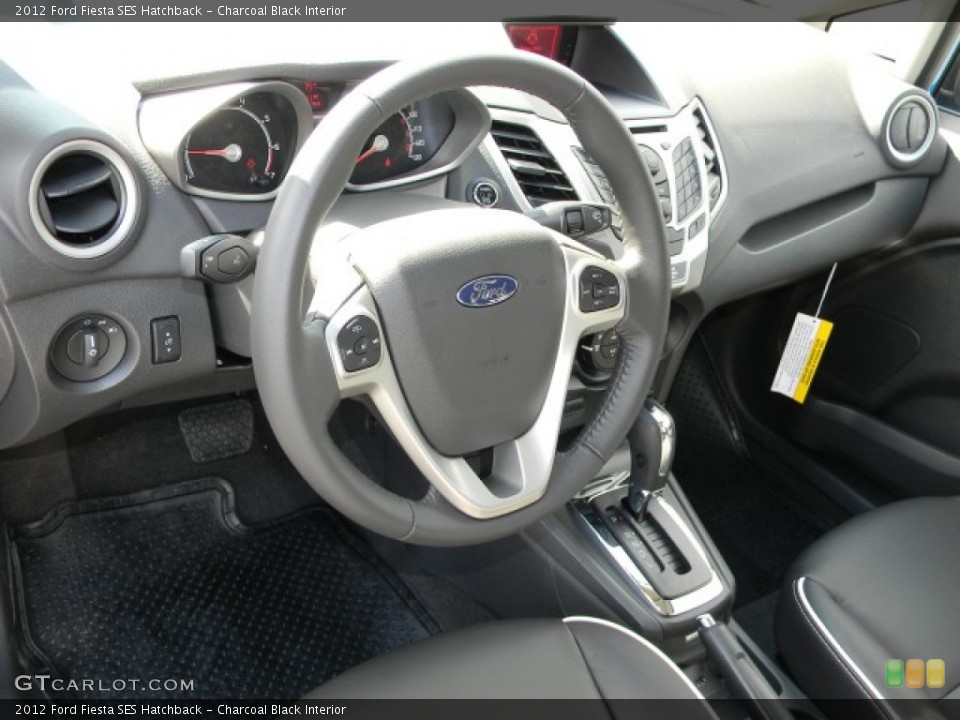 Charcoal Black Interior Steering Wheel for the 2012 Ford Fiesta SES Hatchback #57883711