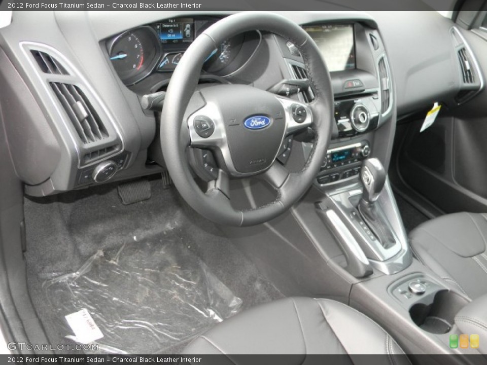 Charcoal Black Leather Interior Dashboard for the 2012 Ford Focus Titanium Sedan #57885178