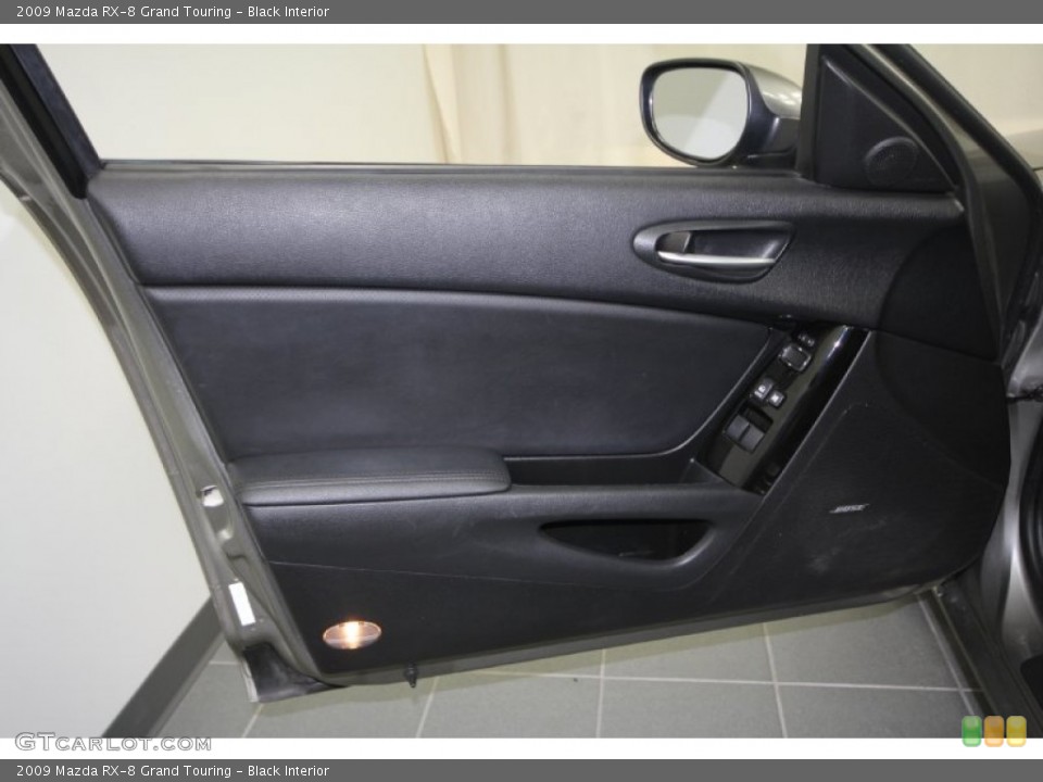 Black Interior Door Panel for the 2009 Mazda RX-8 Grand Touring #57927473