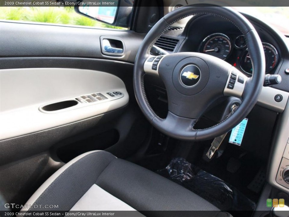 Ebony/Gray UltraLux Interior Steering Wheel for the 2009 Chevrolet Cobalt SS Sedan #58011083