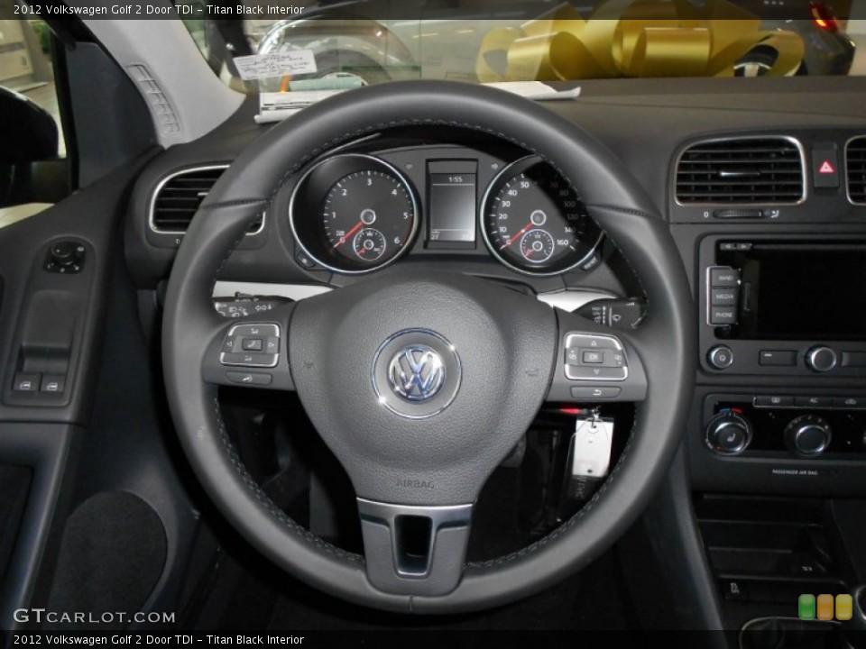 Titan Black Interior Steering Wheel for the 2012 Volkswagen Golf 2 Door TDI #58013132