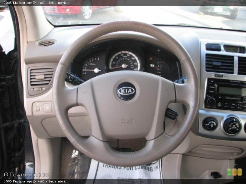 Beige Interior Steering Wheel for the 2005 Kia Sportage EX 4WD #58130287
