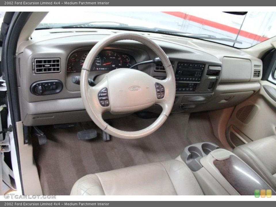 Medium Parchment Interior Dashboard for the 2002 Ford Excursion Limited 4x4 #58170335