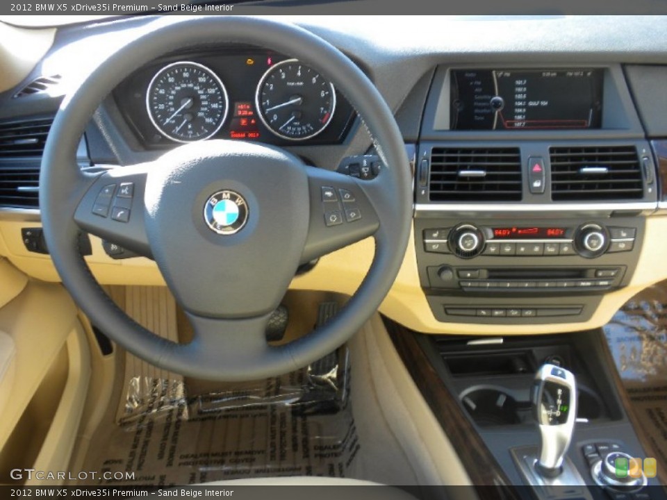Sand Beige Interior Dashboard for the 2012 BMW X5 xDrive35i Premium #58190564