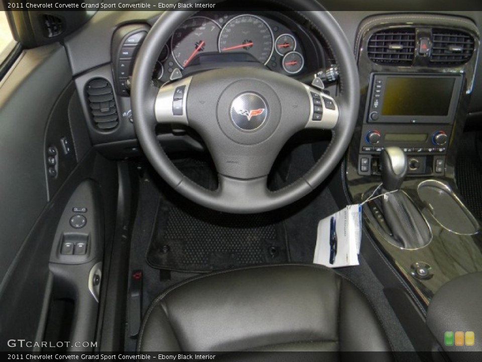 Ebony Black Interior Steering Wheel for the 2011 Chevrolet Corvette Grand Sport Convertible #58231142