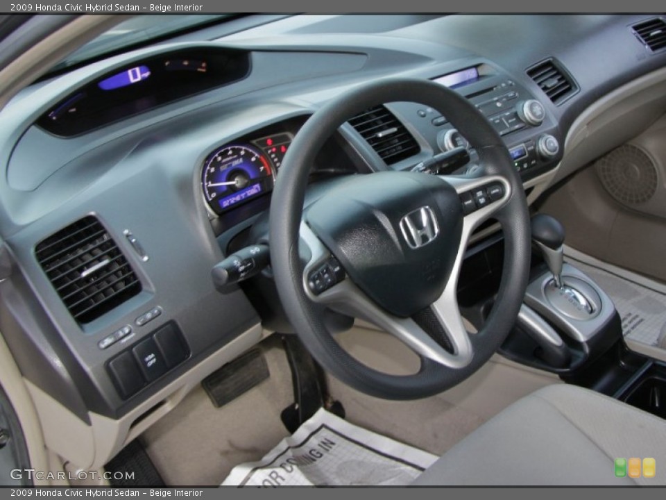 Beige Interior Steering Wheel for the 2009 Honda Civic Hybrid Sedan #58242682