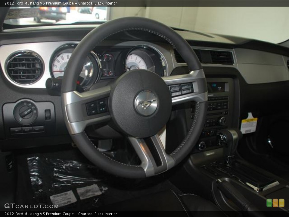 Charcoal Black Interior Steering Wheel for the 2012 Ford Mustang V6 Premium Coupe #58266268