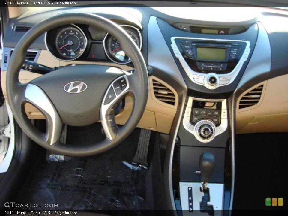 Beige Interior Dashboard for the 2011 Hyundai Elantra GLS #58272503