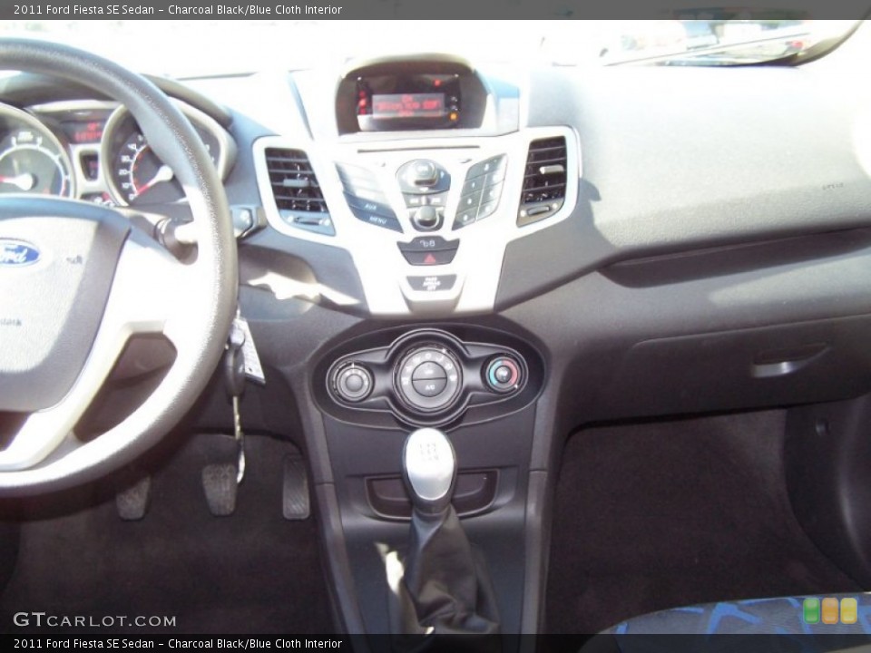 Charcoal Black/Blue Cloth Interior Controls for the 2011 Ford Fiesta SE Sedan #58315666