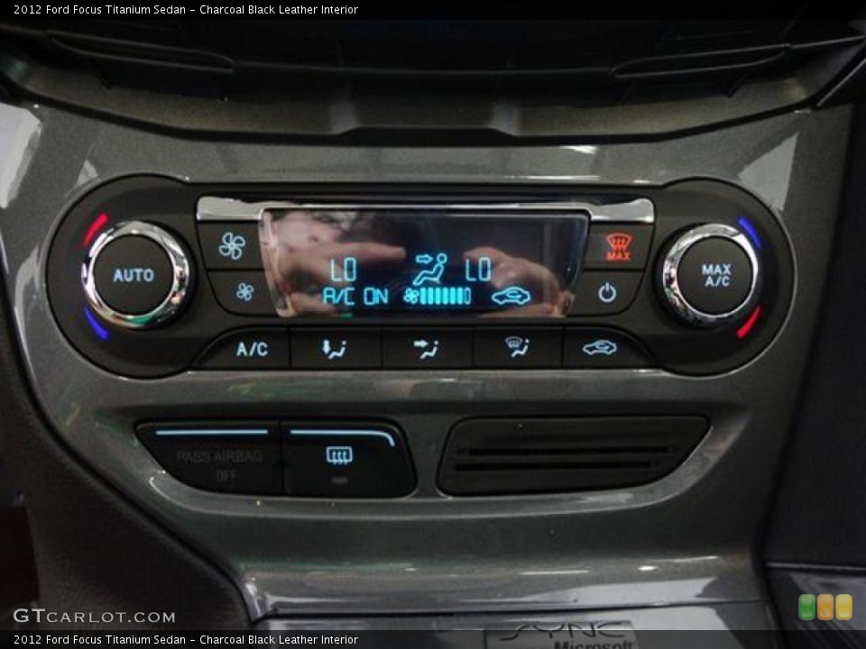 Charcoal Black Leather Interior Controls for the 2012 Ford Focus Titanium Sedan #58336902