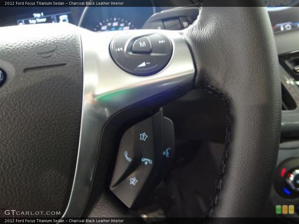 Charcoal Black Leather Interior Controls for the 2012 Ford Focus Titanium Sedan #58336935