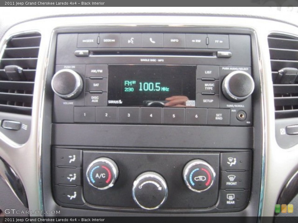 Black Interior Controls for the 2011 Jeep Grand Cherokee Laredo 4x4 #58384089
