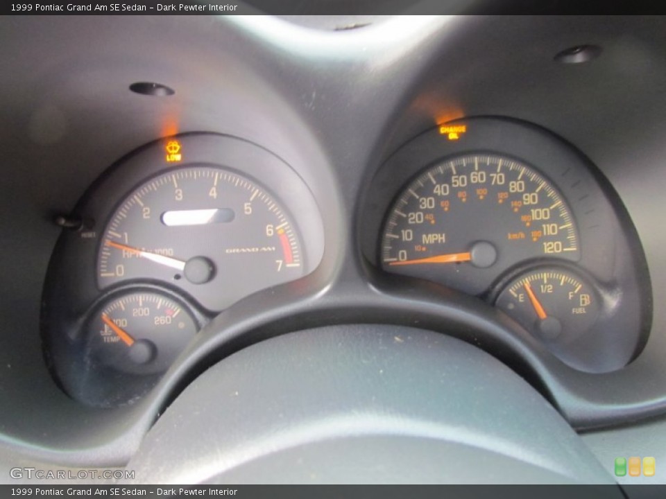 Dark Pewter Interior Gauges for the 1999 Pontiac Grand Am SE Sedan #58400888