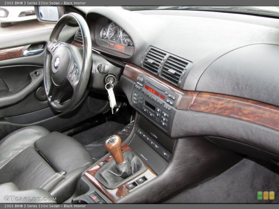 Black Interior Dashboard for the 2003 BMW 3 Series 330xi Sedan #58436796