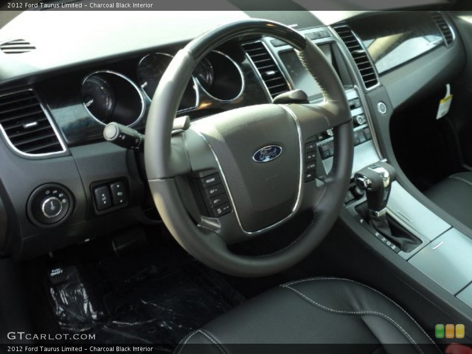 Charcoal Black Interior Steering Wheel for the 2012 Ford Taurus Limited #58438743