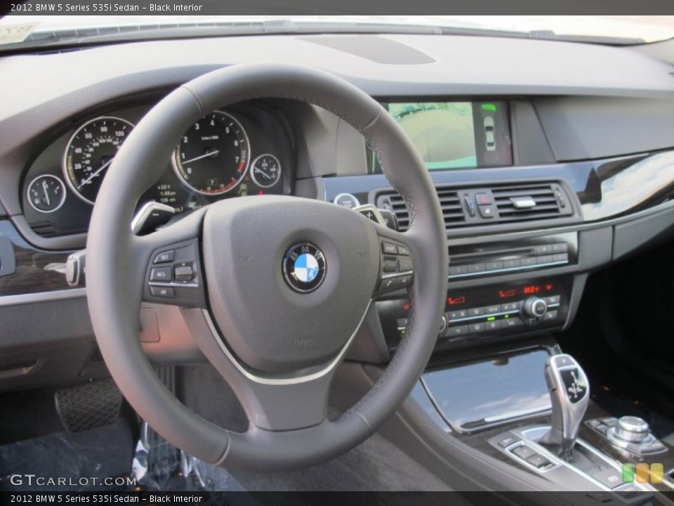 Black Interior Steering Wheel for the 2012 BMW 5 Series 535i Sedan #58457474
