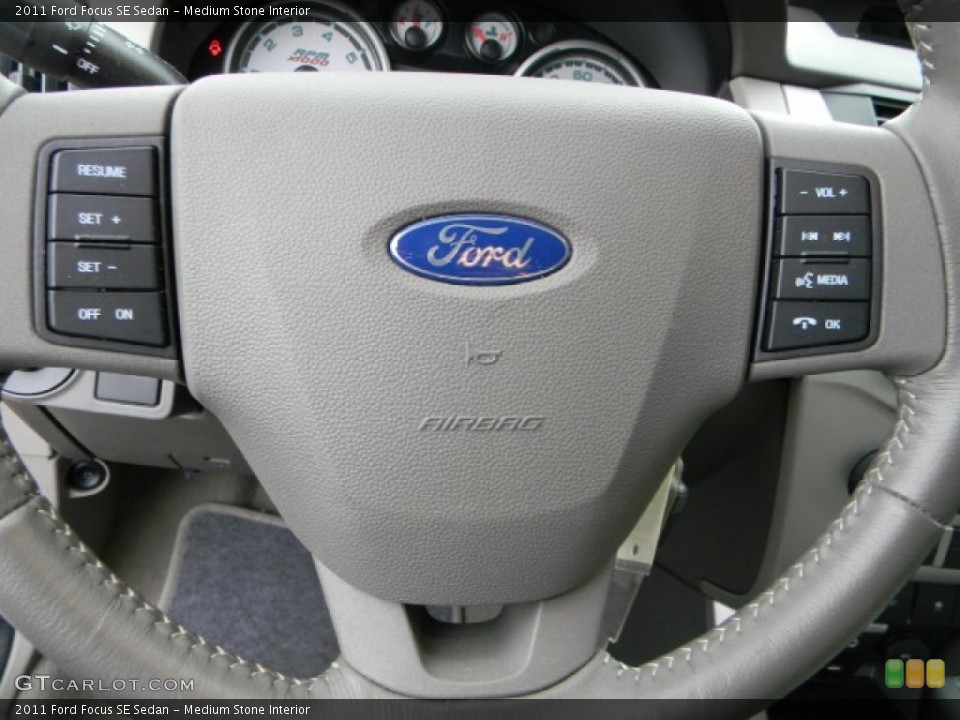 Medium Stone Interior Controls for the 2011 Ford Focus SE Sedan #58485766