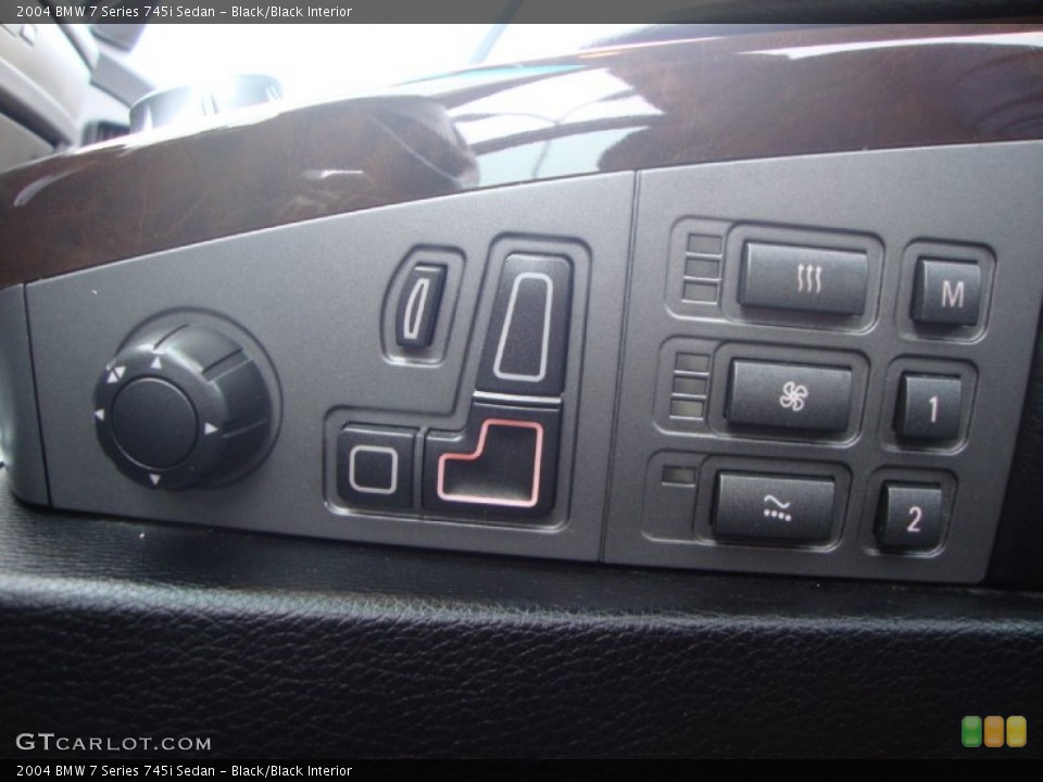 Black/Black Interior Controls for the 2004 BMW 7 Series 745i Sedan #58494193