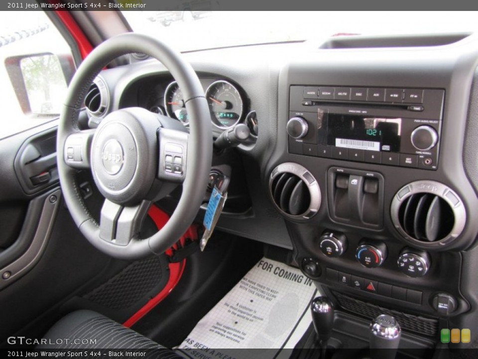 Black Interior Dashboard for the 2011 Jeep Wrangler Sport S 4x4 #58500481