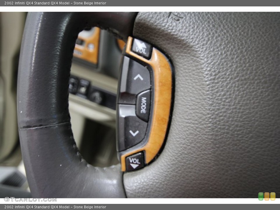 Stone Beige Interior Controls for the 2002 Infiniti QX4  #58504539