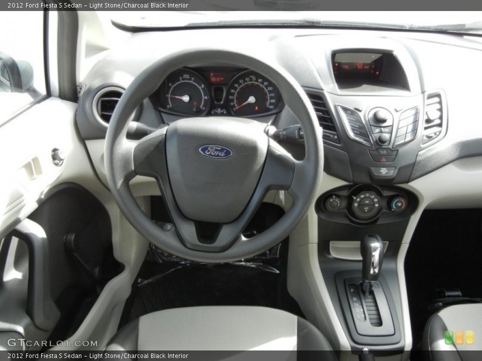 Light Stone/Charcoal Black Interior Dashboard for the 2012 Ford Fiesta S Sedan #58554592