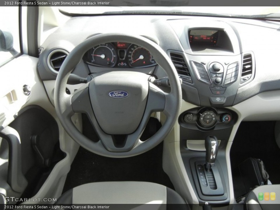 Light Stone/Charcoal Black Interior Dashboard for the 2012 Ford Fiesta S Sedan #58554628