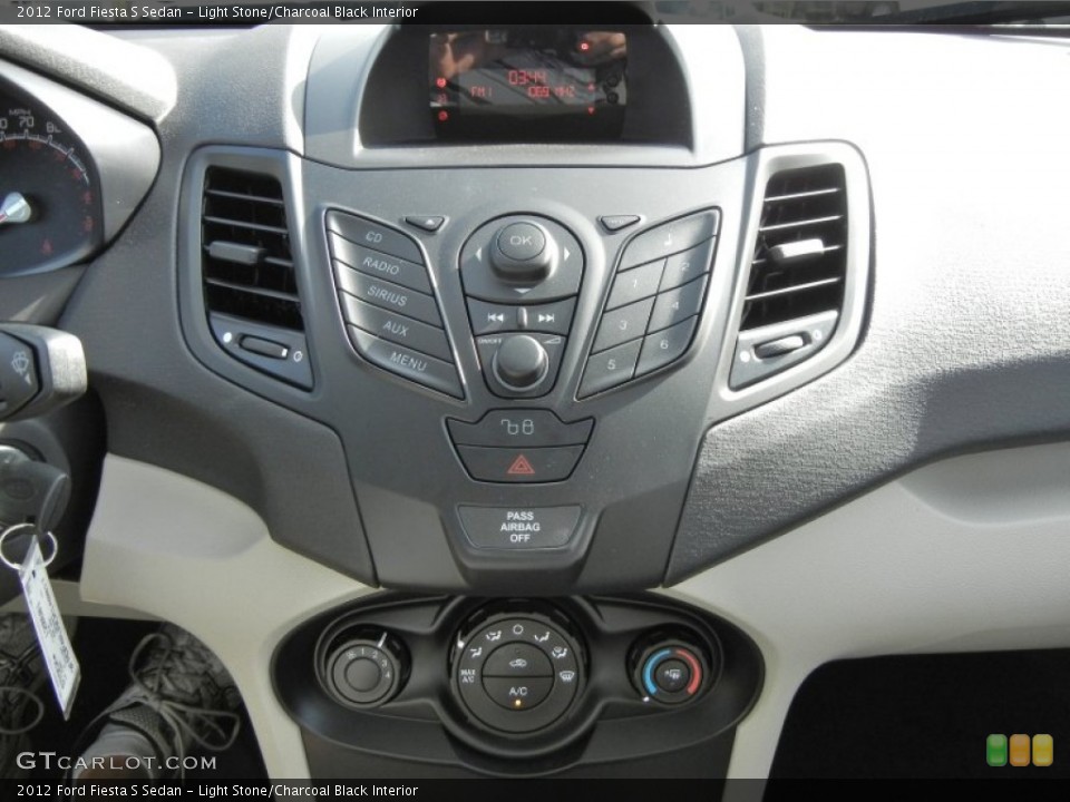 Light Stone/Charcoal Black Interior Controls for the 2012 Ford Fiesta S Sedan #58554634