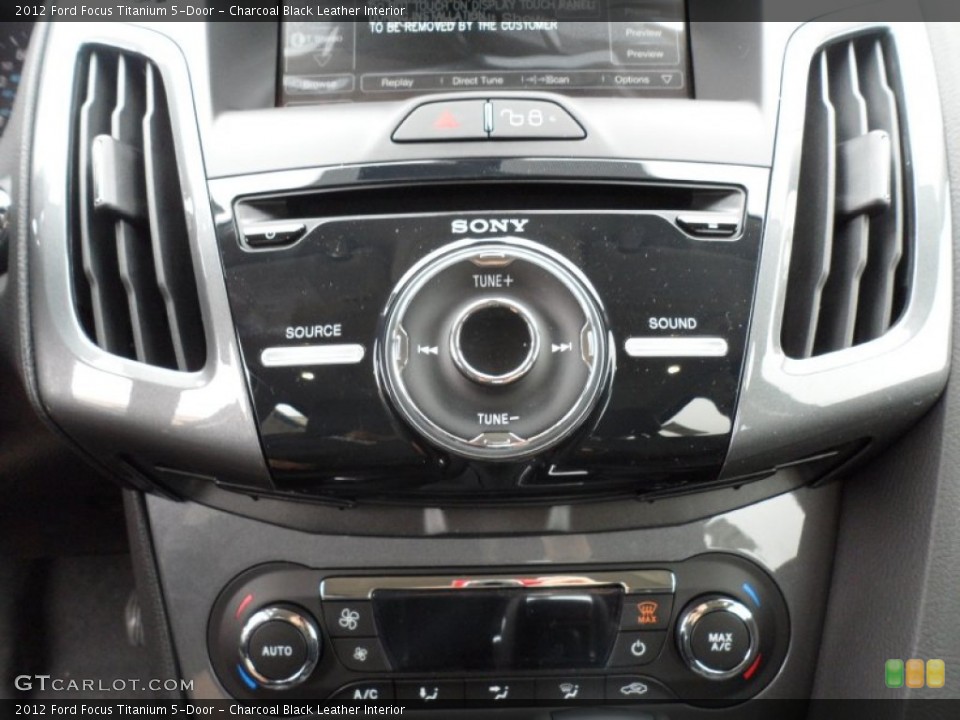 Charcoal Black Leather Interior Controls for the 2012 Ford Focus Titanium 5-Door #58587651