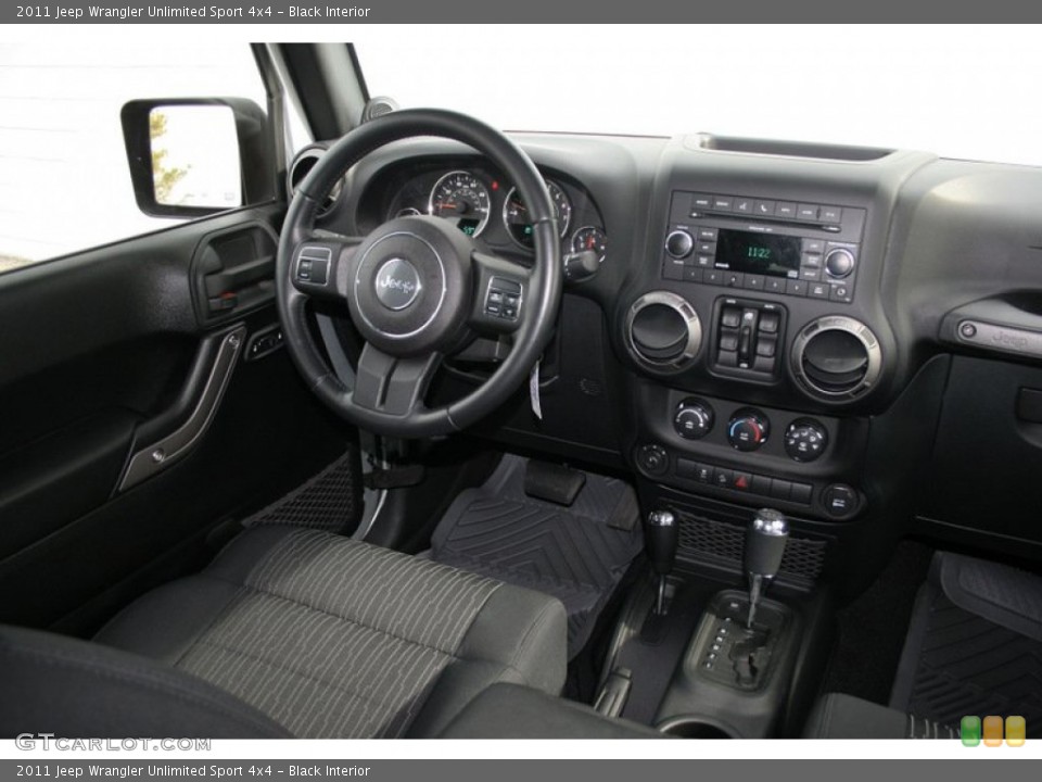 Black Interior Dashboard for the 2011 Jeep Wrangler Unlimited Sport 4x4 #58589754