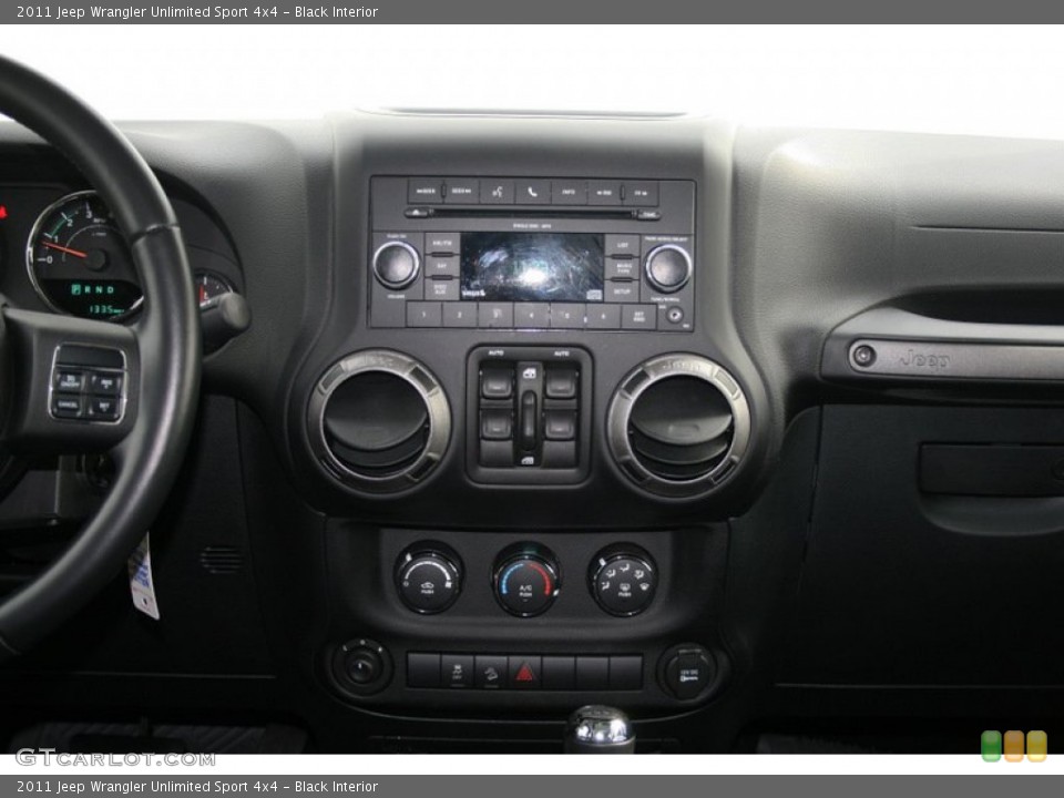Black Interior Controls for the 2011 Jeep Wrangler Unlimited Sport 4x4 #58589763